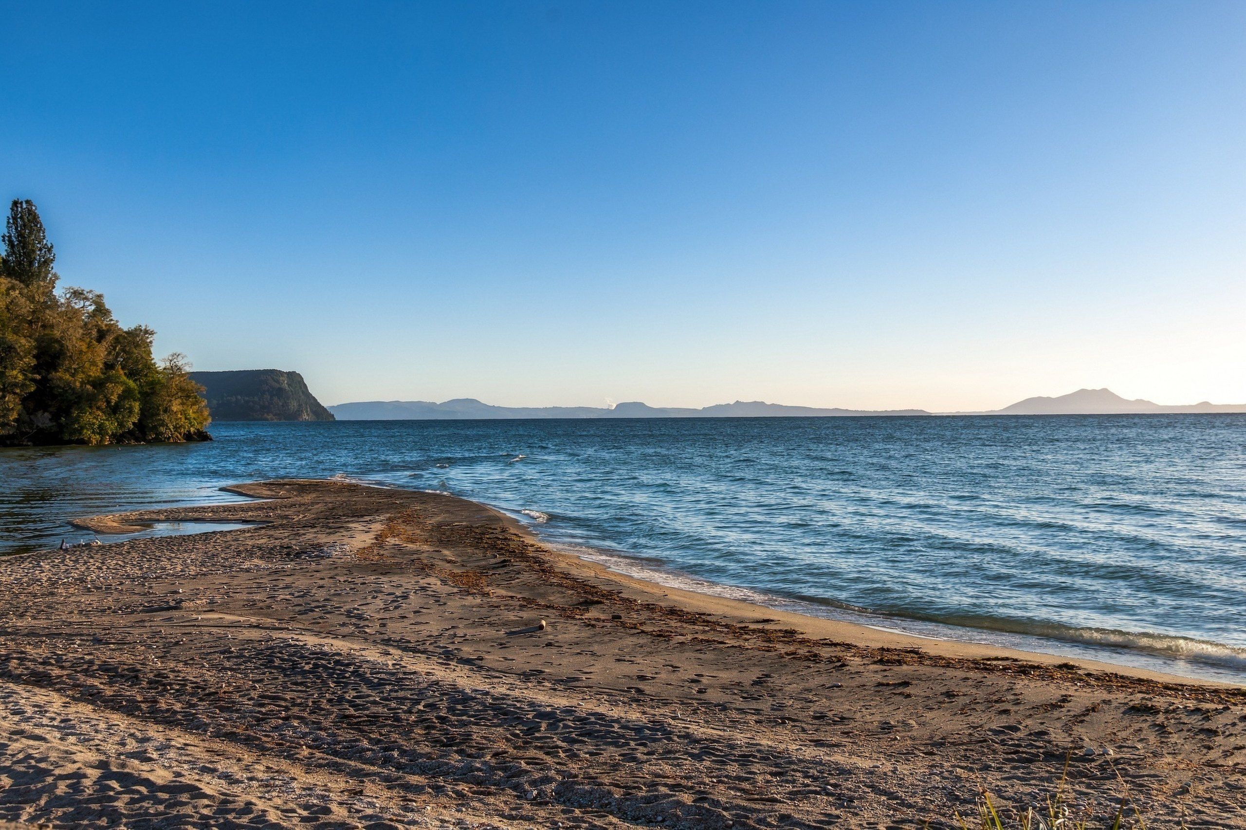 Sandy beach at Kuratau looking across Lake Taupō
